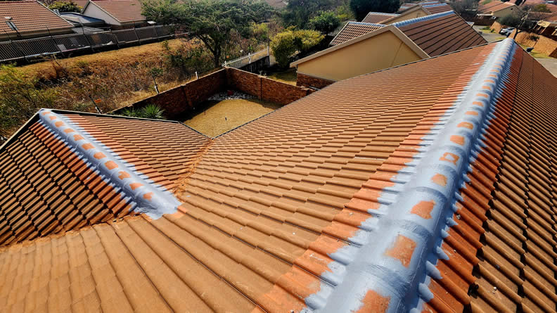 Residential Complex Roof Ridge Repair